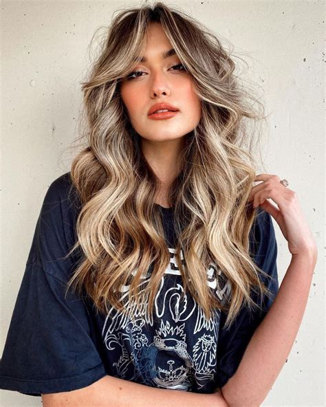 For those who to brighten their hair and give it a subtle contrast, caramel <strong>blonde</strong>, which has a gorgeous golden appearance, is an excellent choice. . Blonde highlights with fringe